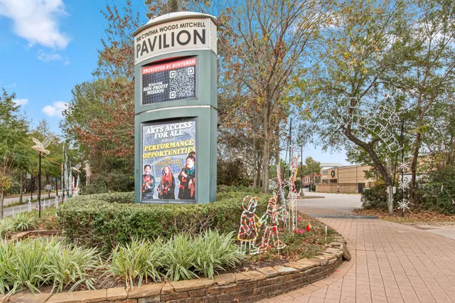 a view of a sign board with street
