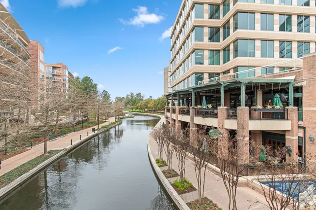 a view of staircase with white walls