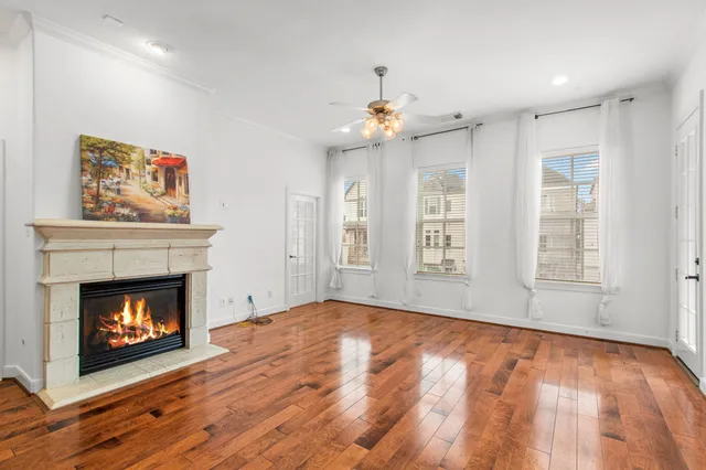 a view of kitchen with cabinets and wooden floor