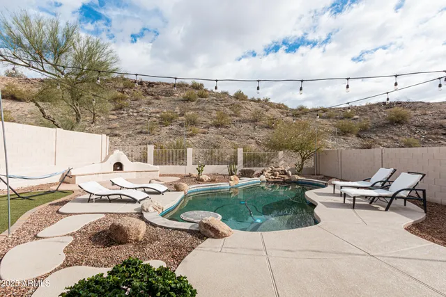 a view of a terrace with chairs and couches