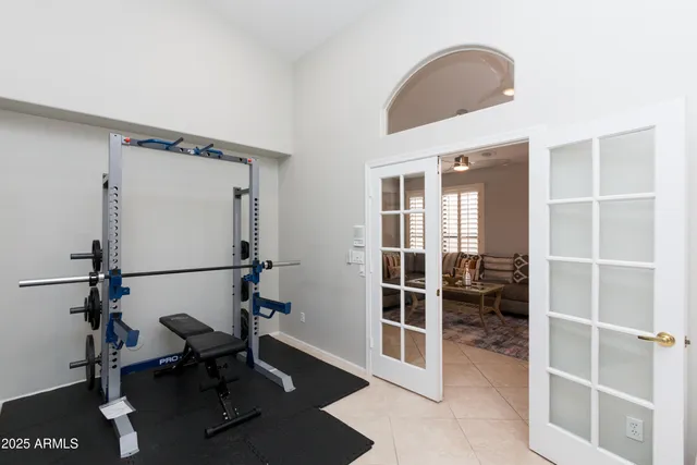 a view of workspace with wooden floor and windows
