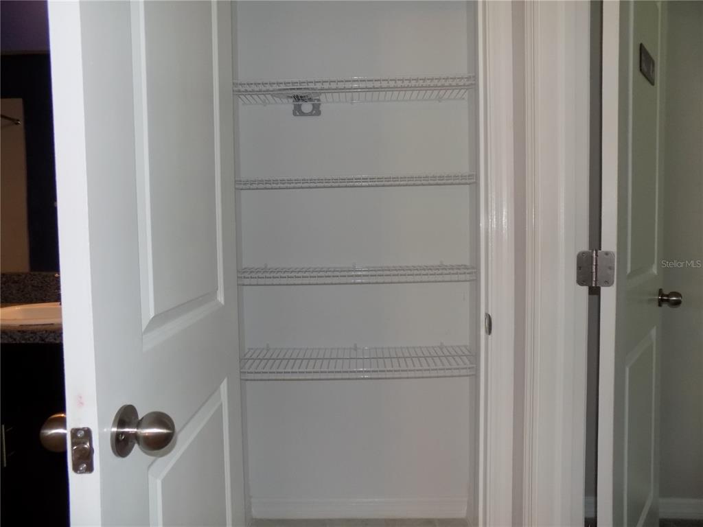 9411 Lemon Drop Loop Sun City Center, FL 33573 - Photo 18 of 47 a view of a closet