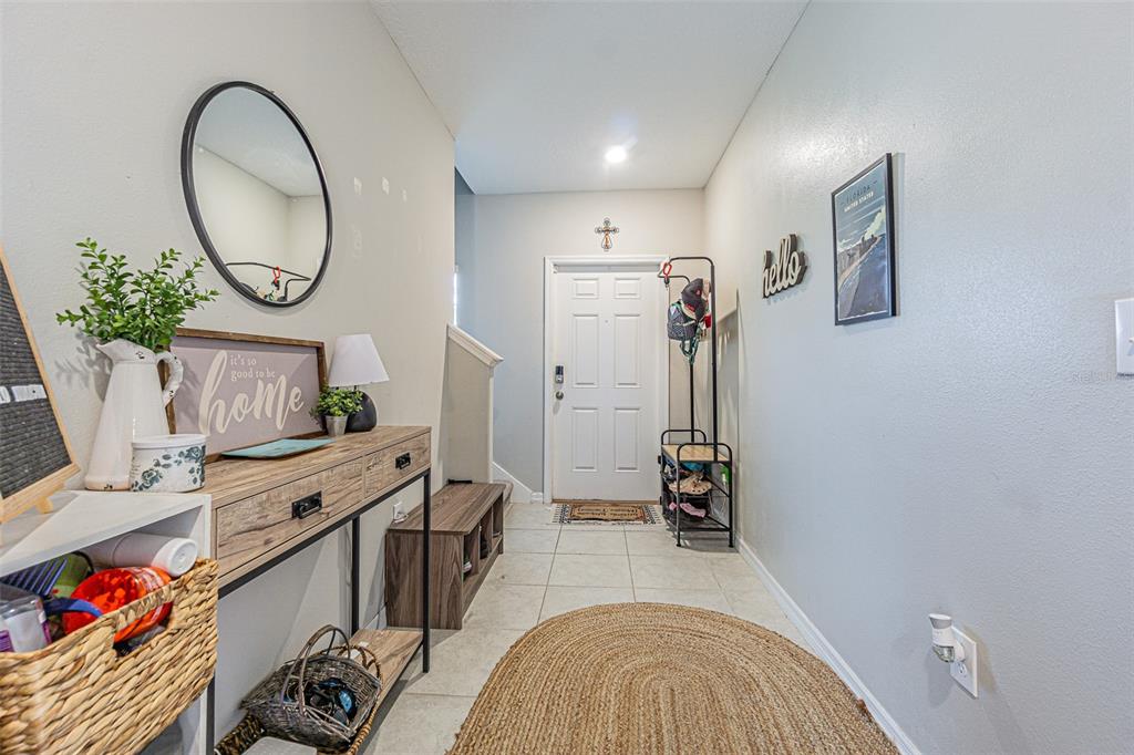 9411 Lemon Drop Loop Sun City Center, FL 33573 - Photo 4 of 47 a view of a livingroom with furniture and toys