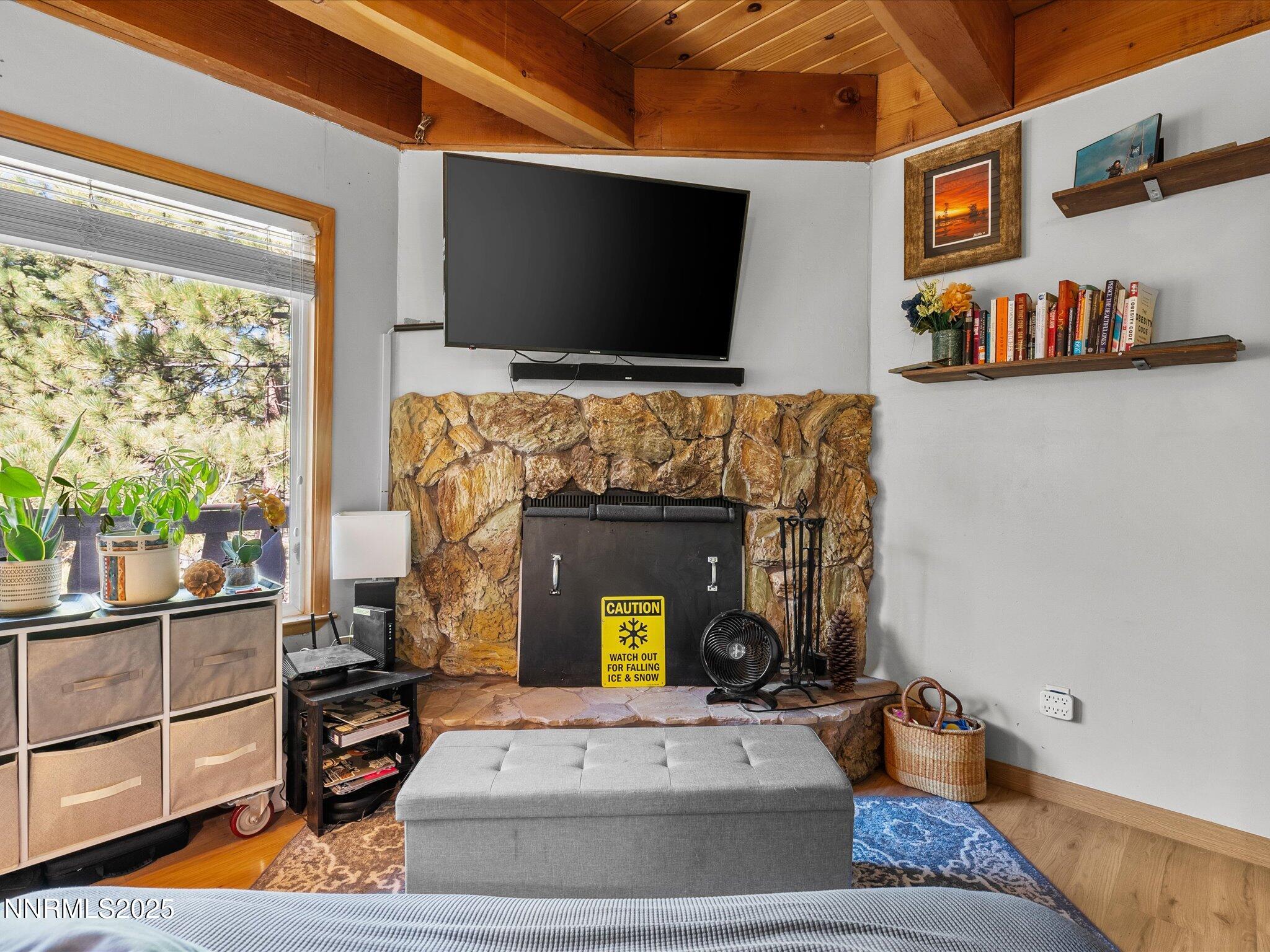 259 Tramway Drive, Unit 4 Stateline, NV 89449 - Photo 11 of 33 a living room with furniture and a flat screen tv
