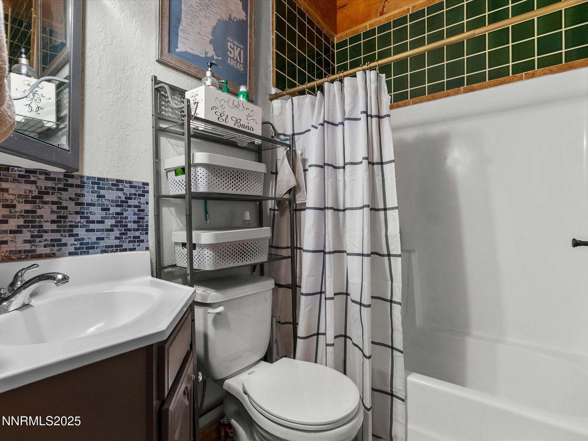 259 Tramway Drive, Unit 4 Stateline, NV 89449 - Photo 16 of 33 a bathroom with a sink toilet and shower