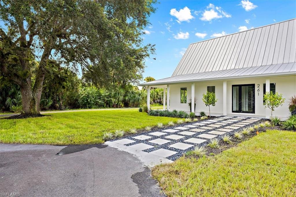 261 13th Street Southwest Naples, FL 34117 - Photo 3 of 35 View of yard
