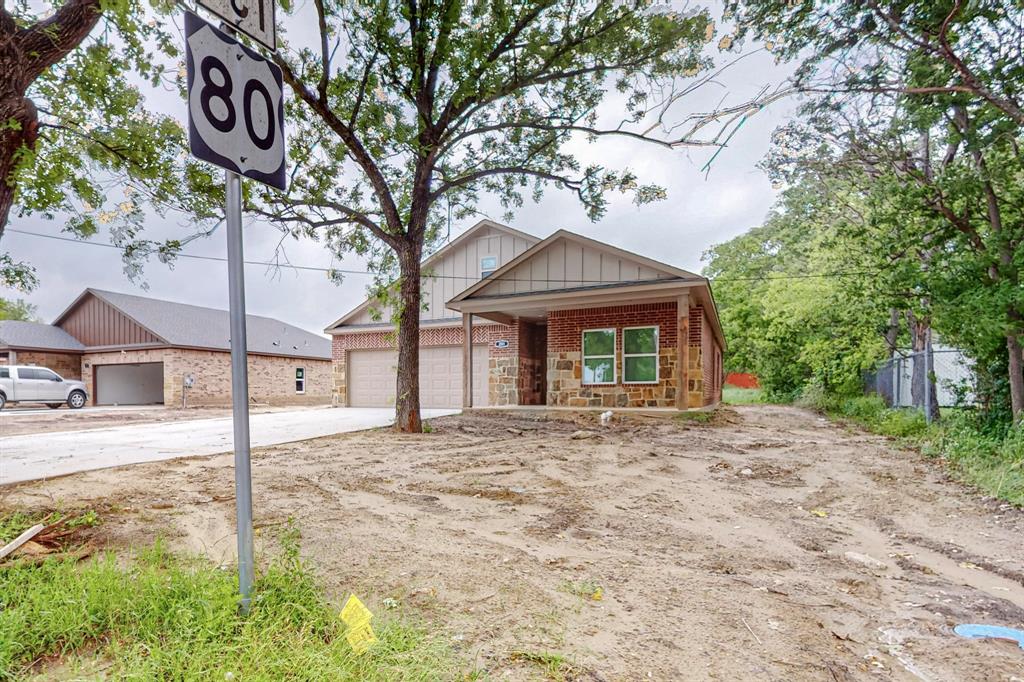 201 Dellis Street Terrell, TX 75160 - Photo 11 of 12 a front view of a house with garden