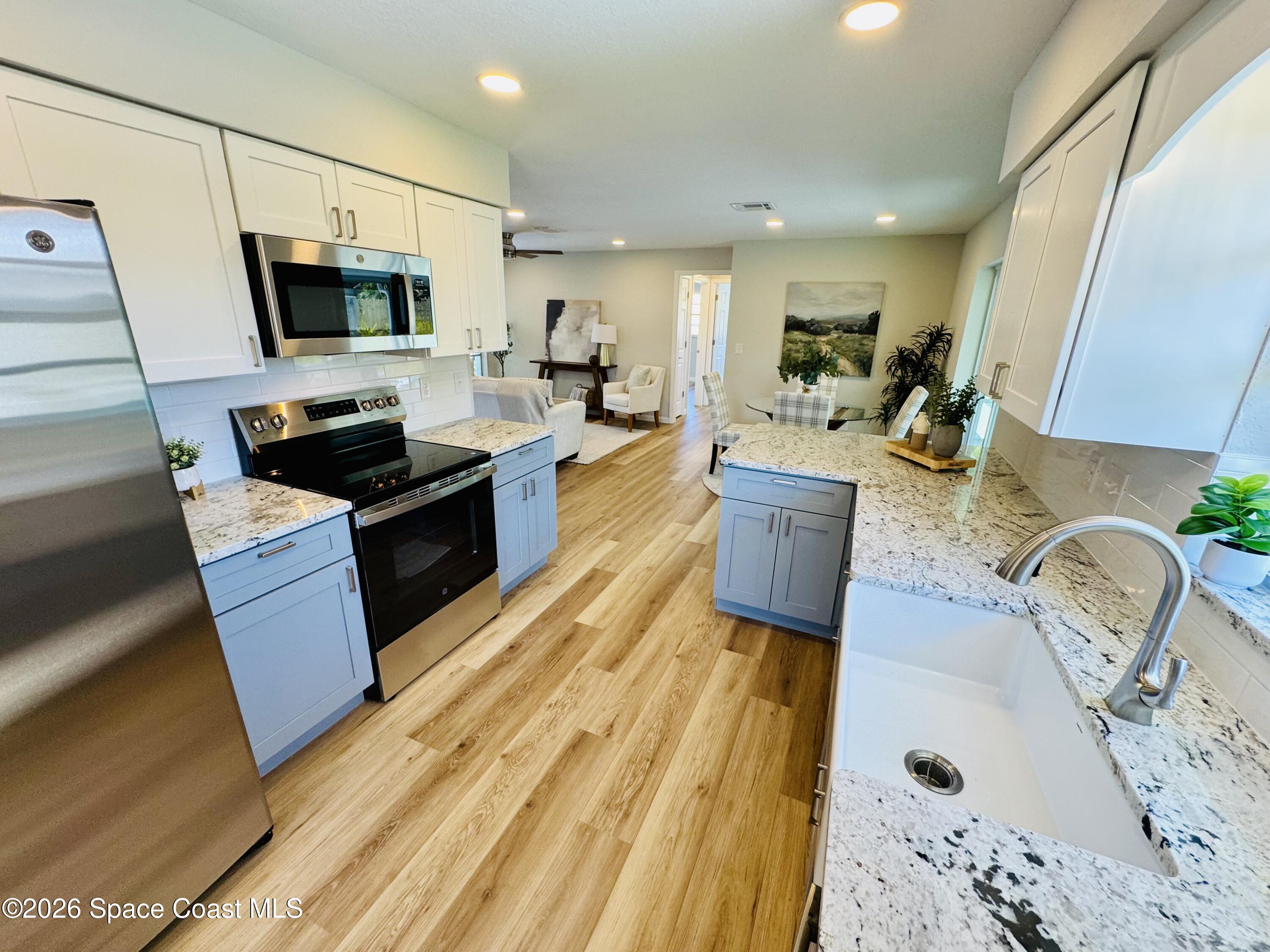 1910 Tallridge Road Melbourne, FL 32935 - Photo 7 of 34 Kitchen from laundry