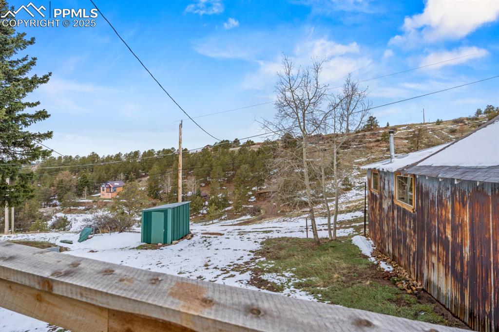 315 5th Street Victor, CO 80860 - Photo 11 of 15 a view of a backyard with wooden fence