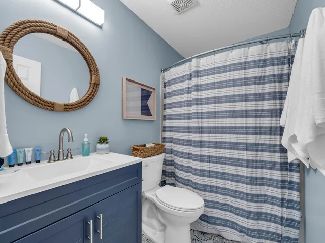 a view of bedroom and bathroom
