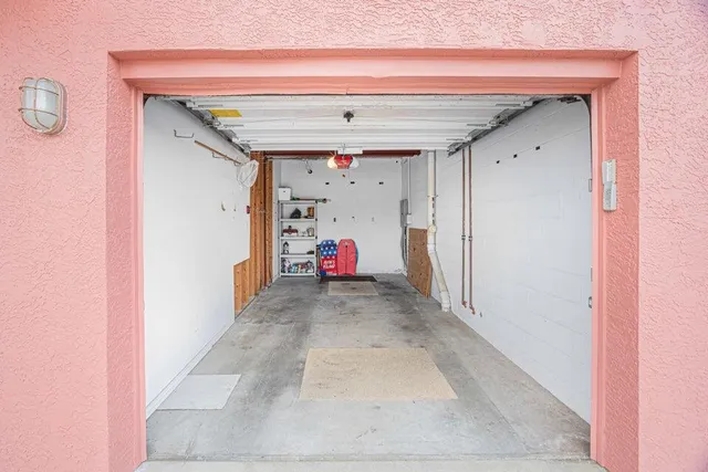 a view of a swimming pool with a lounge chairs