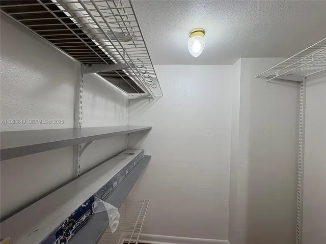 a view of a street with some trees