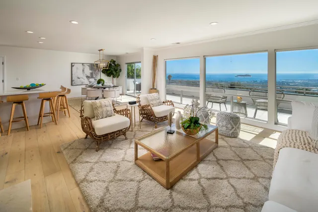 a living room with furniture and a table