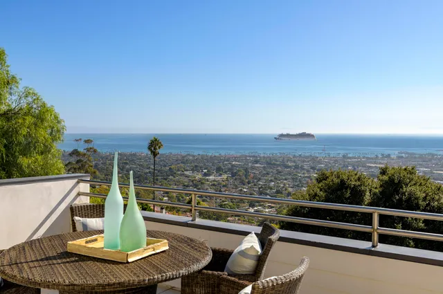 a view of a ocean from a balcony
