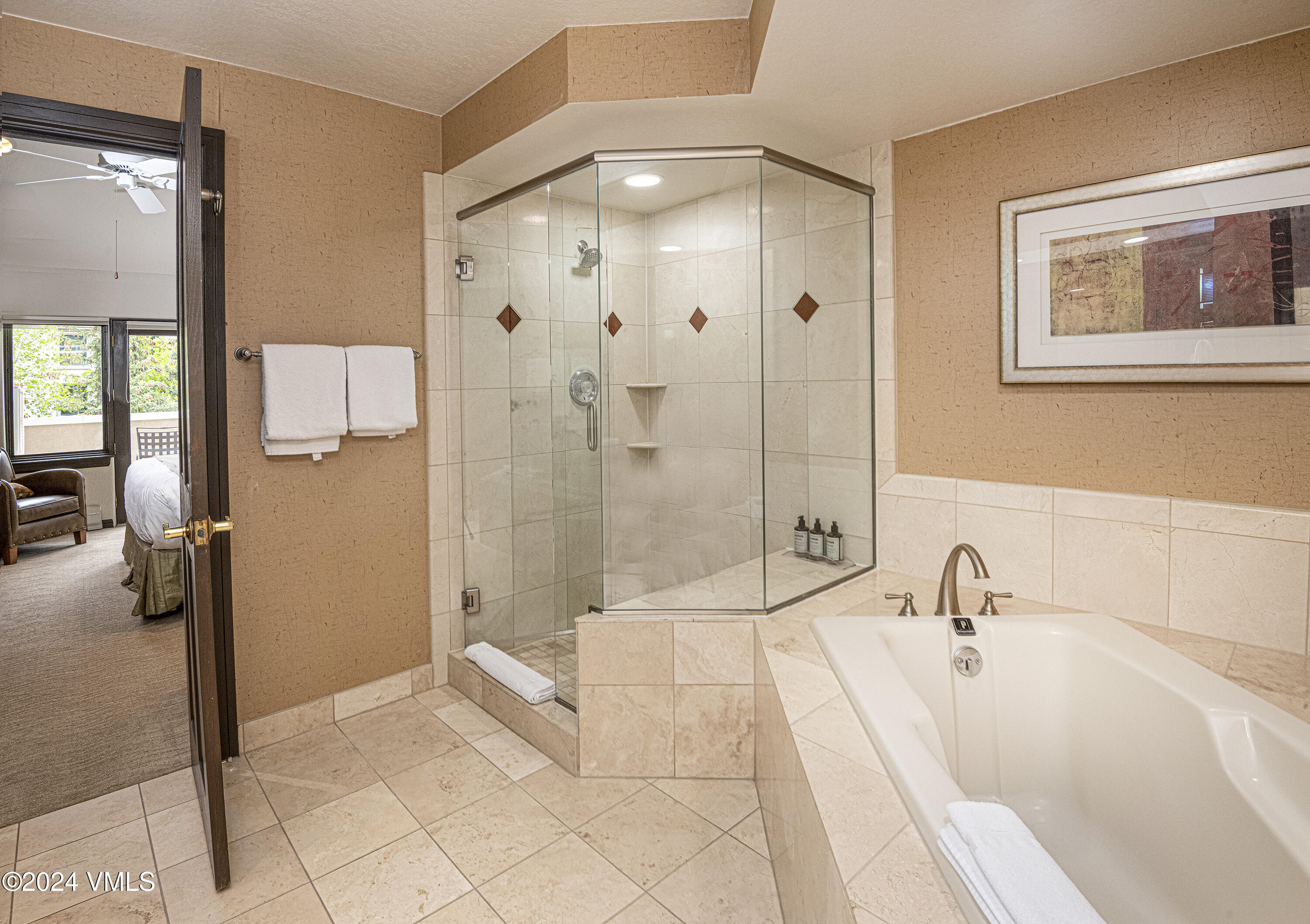 210 Offerson Road, Unit 3054 Beaver Creek, CO 81620 - Photo 5 of 7 a bathroom with a tub shower and sink