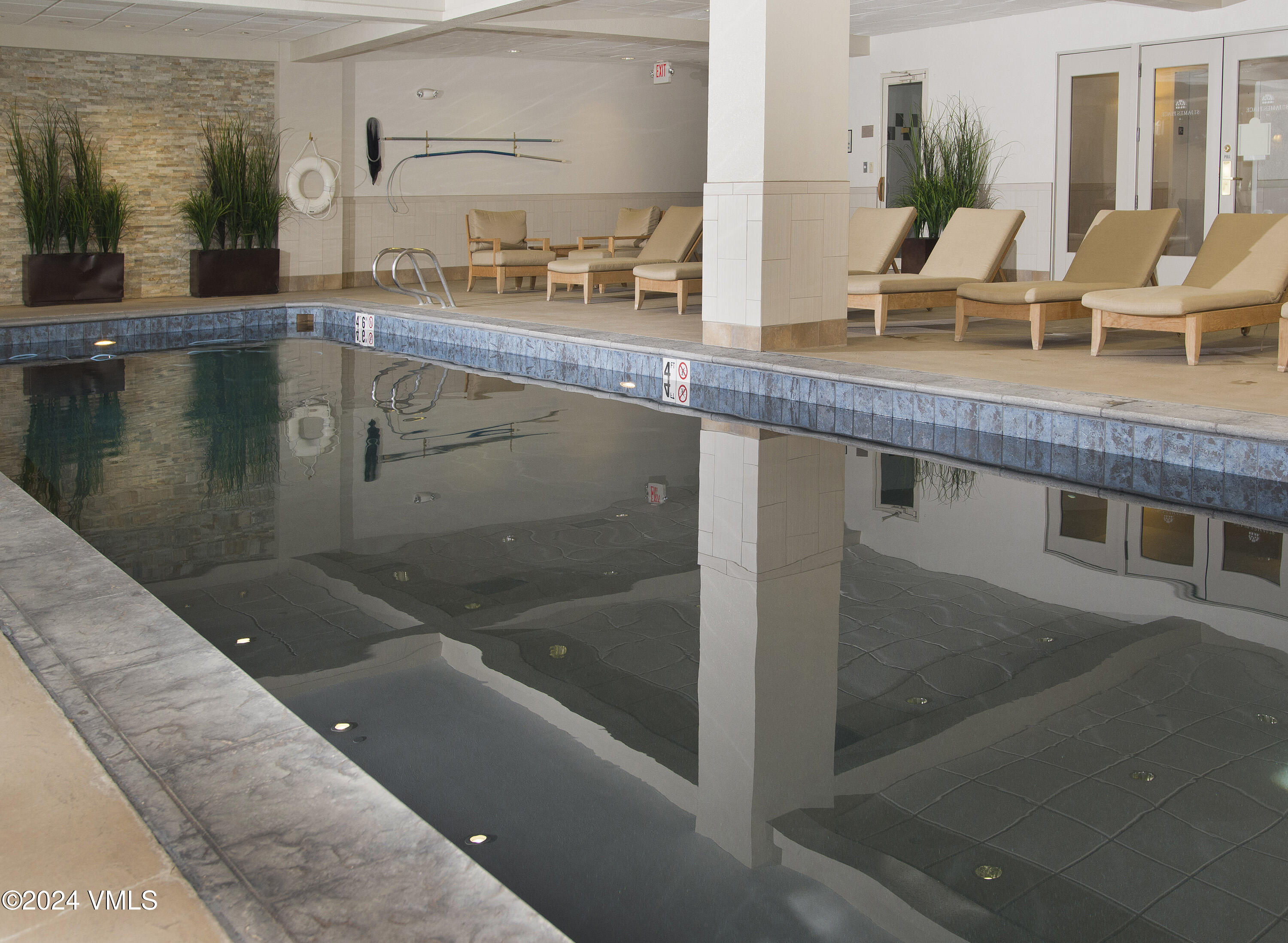 210 Offerson Road, Unit 3054 Beaver Creek, CO 81620 - Photo 7 of 7 a bathroom with a tub sink and mirror