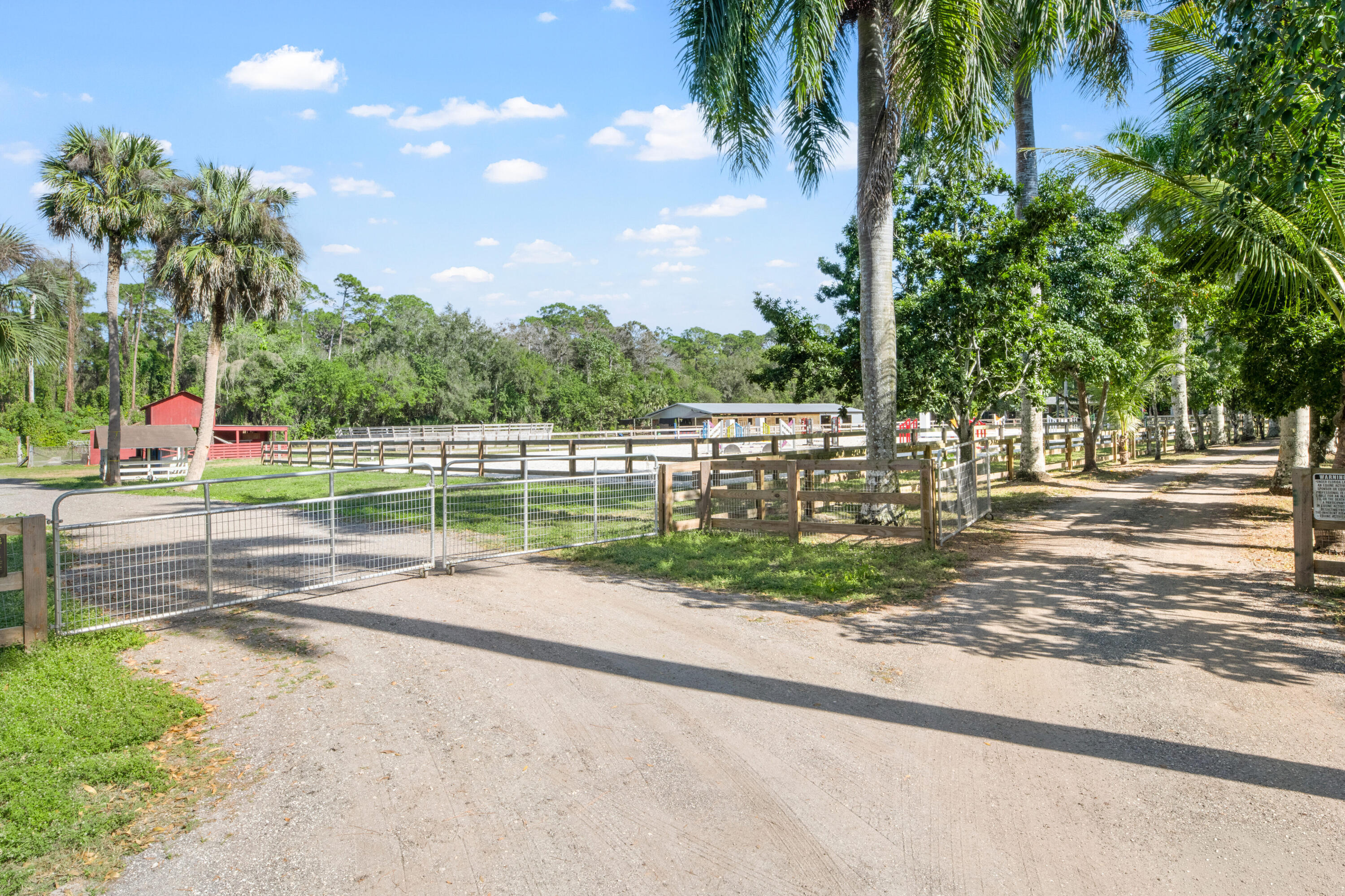 1068 D Road Loxahatchee, FL 33470 - Photo 22 of 73 a view of a yard with palm tree