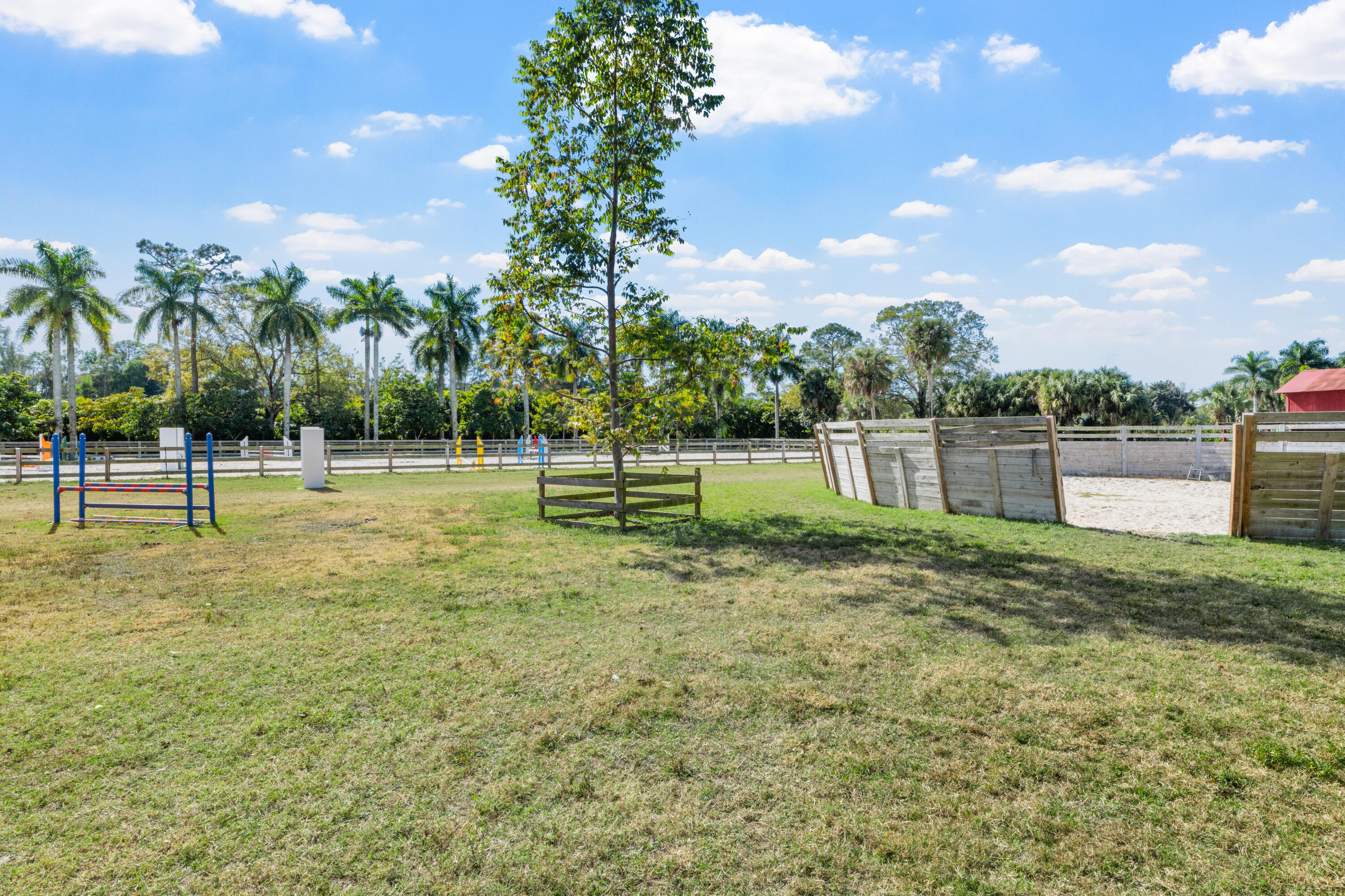 1068 D Road Loxahatchee, FL 33470 - Photo 30 of 73 a view of a park with swings and slides