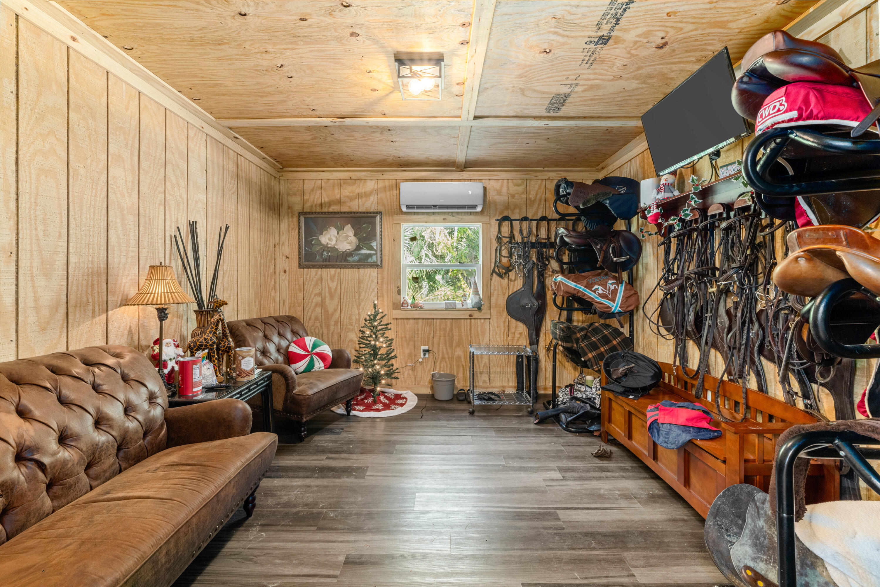 1068 D Road Loxahatchee, FL 33470 - Photo 50 of 73 a living room filled with furniture and a couch