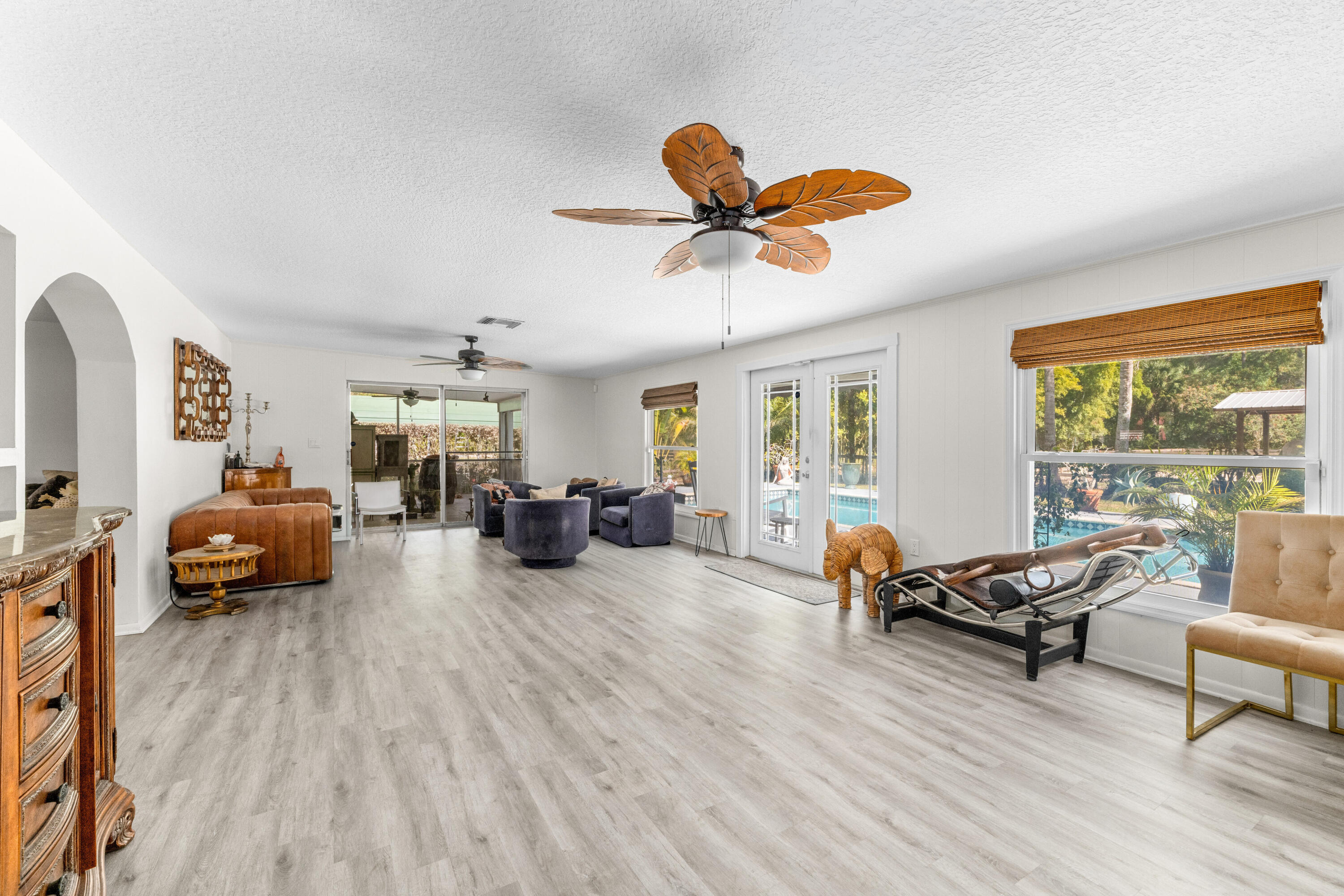 1068 D Road Loxahatchee, FL 33470 - Photo 57 of 73 a living room with furniture and a large window