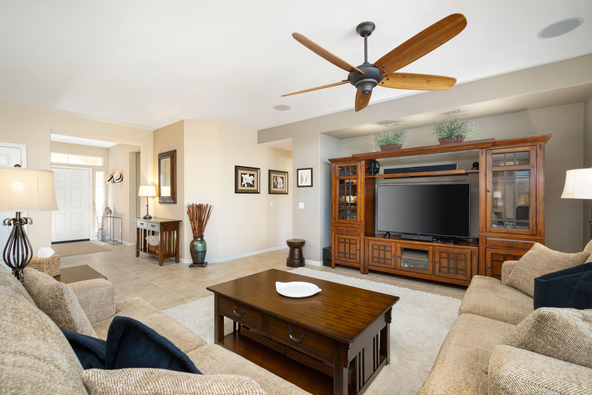81820 Rustic Canyon Drive La Quinta, CA 92253 - Photo 11 of 85 a living room with furniture and a flat screen tv