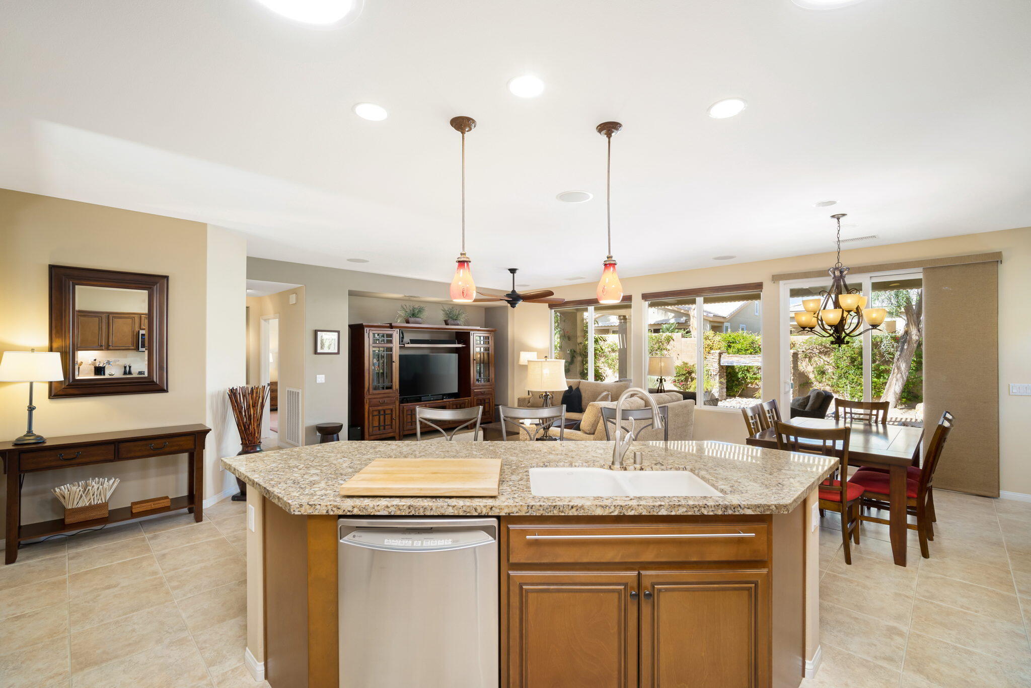 81820 Rustic Canyon Drive La Quinta, CA 92253 - Photo 17 of 85 a kitchen with stainless steel appliances granite countertop a sink and cabinets