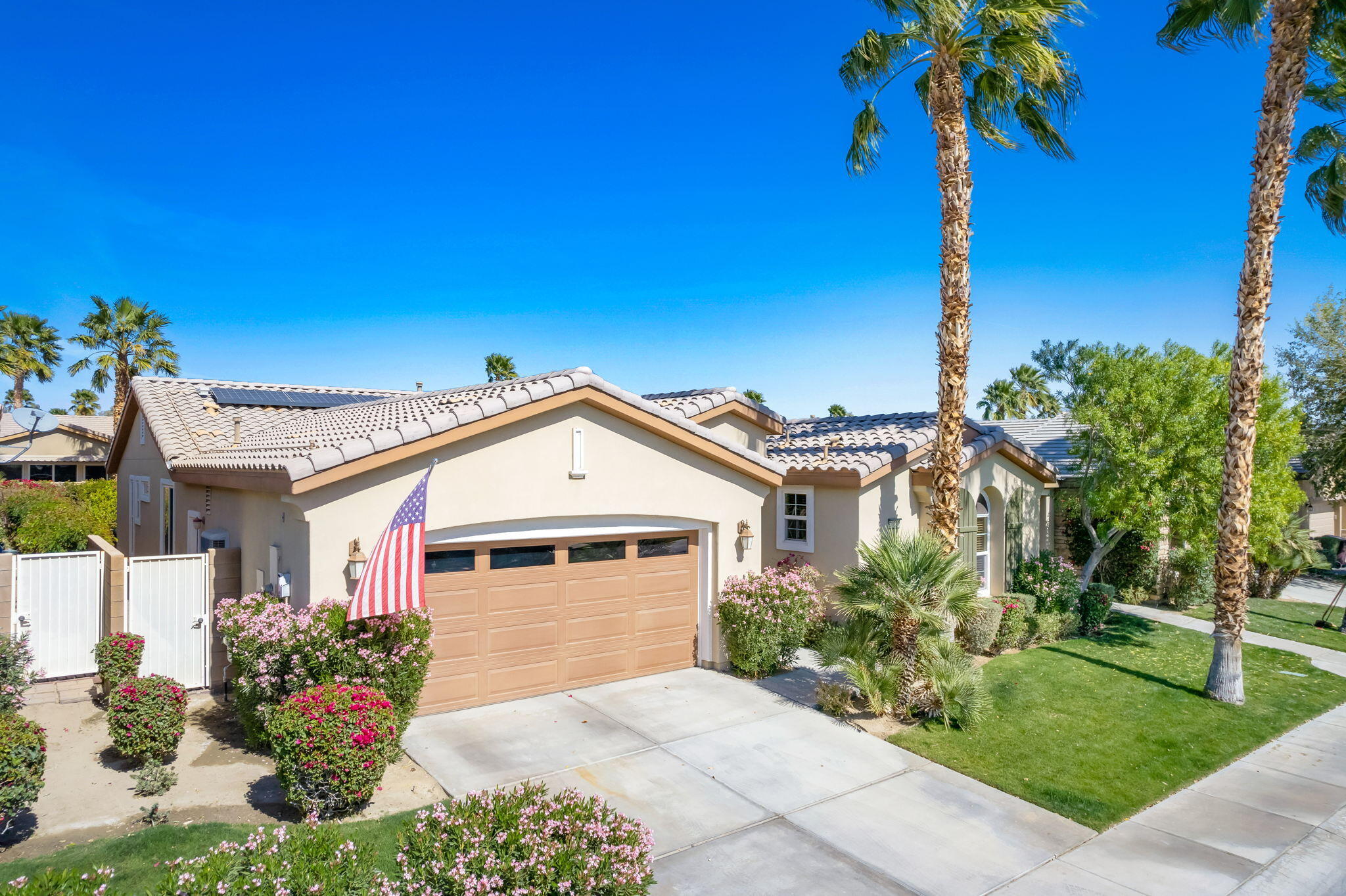 81820 Rustic Canyon Drive La Quinta, CA 92253 - Photo 2 of 85 front view of a house with a yard