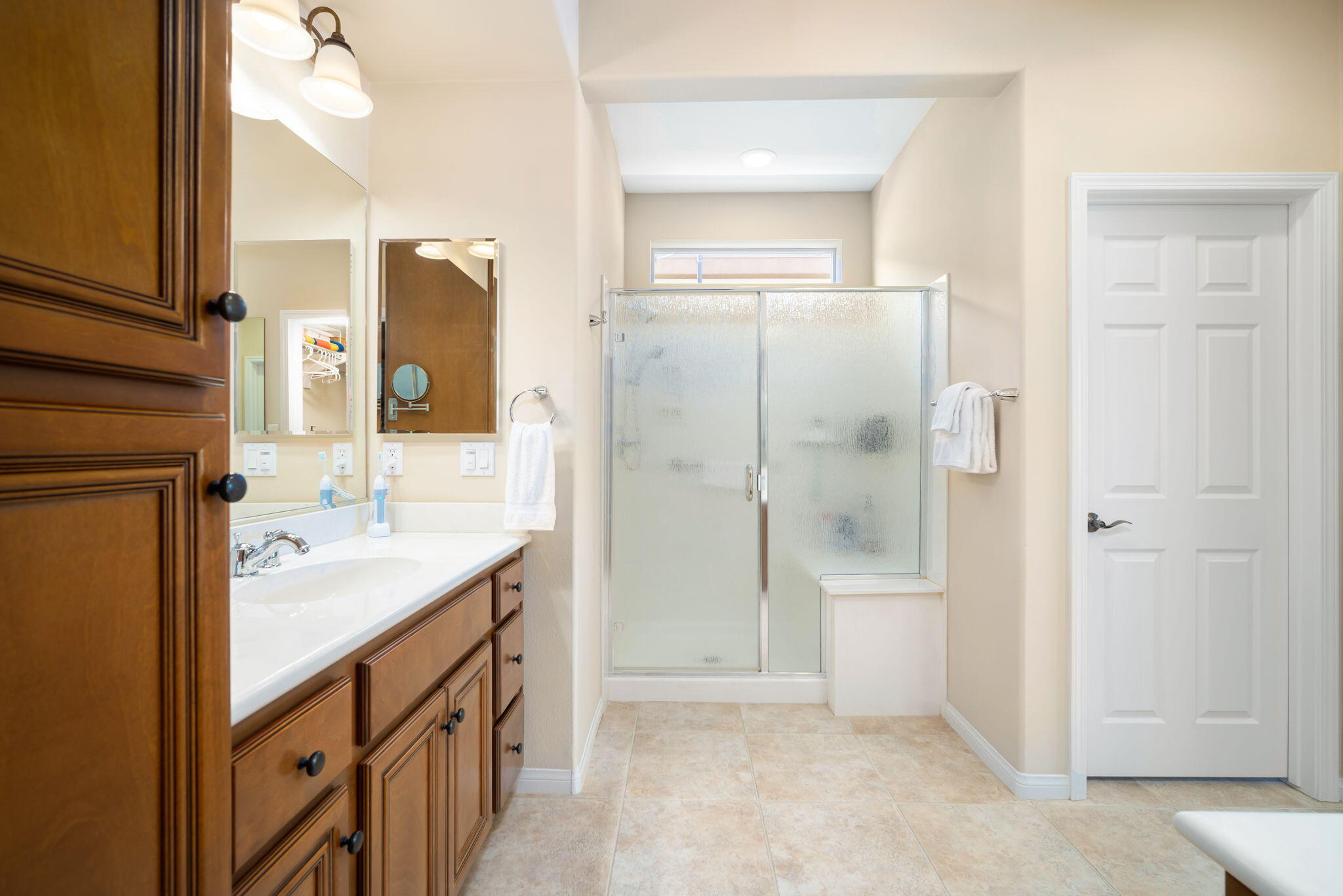 81820 Rustic Canyon Drive La Quinta, CA 92253 - Photo 23 of 85 a bathroom with a granite countertop sink mirror and a shower