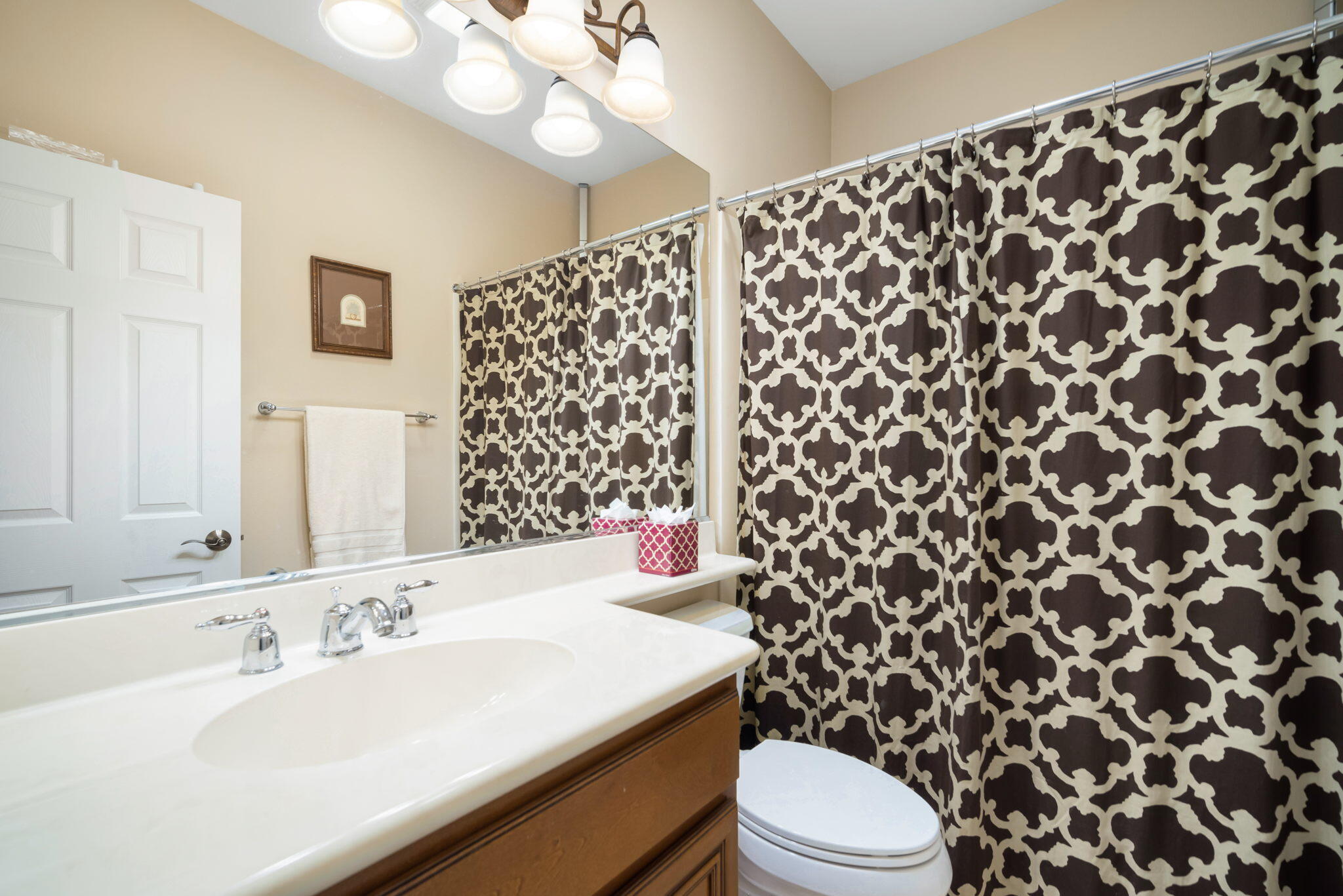 81820 Rustic Canyon Drive La Quinta, CA 92253 - Photo 25 of 85 a bathroom with a sink toilet and shower