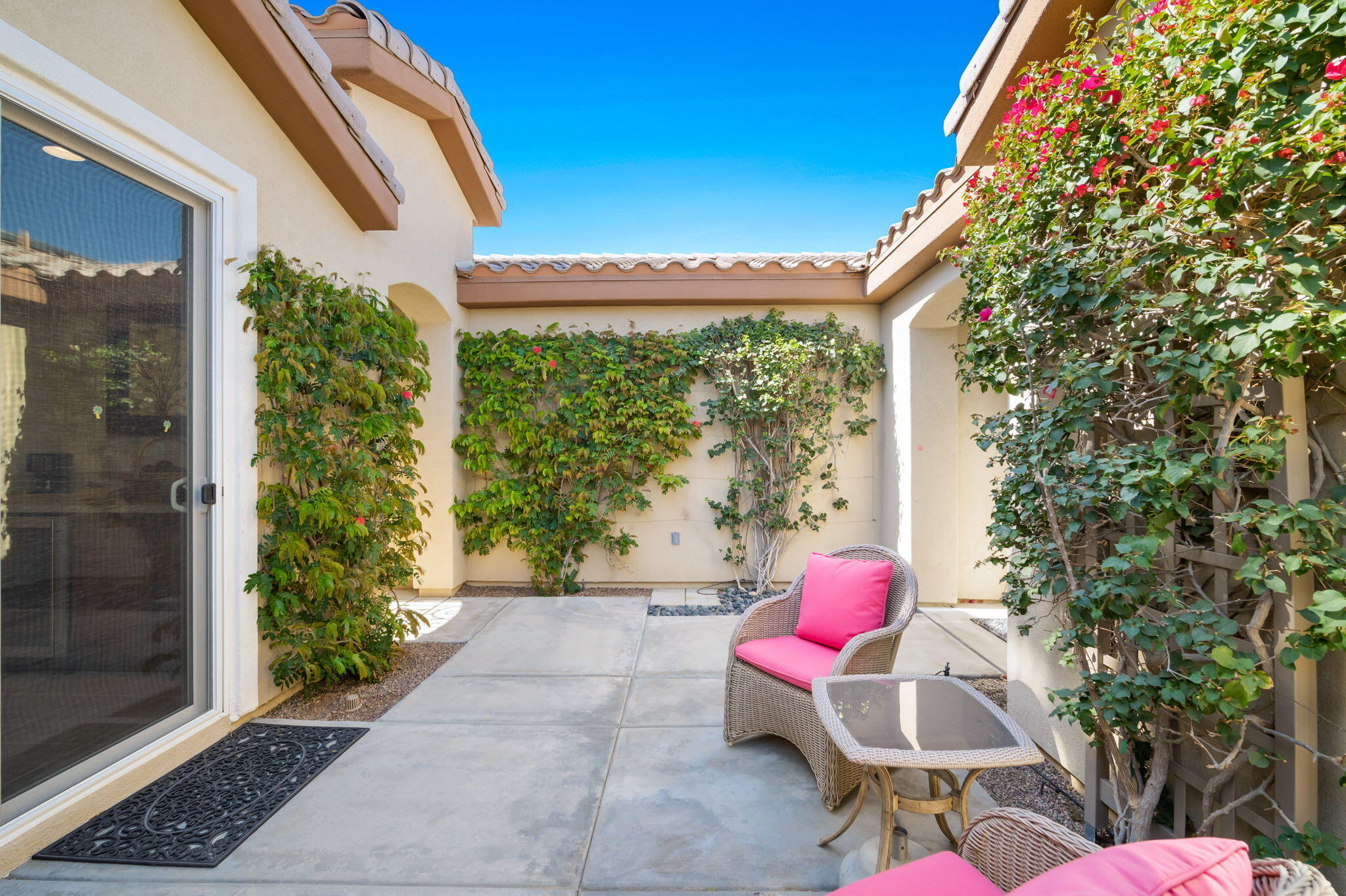 81820 Rustic Canyon Drive La Quinta, CA 92253 - Photo 28 of 85 a living room filled with furniture and a potted plant