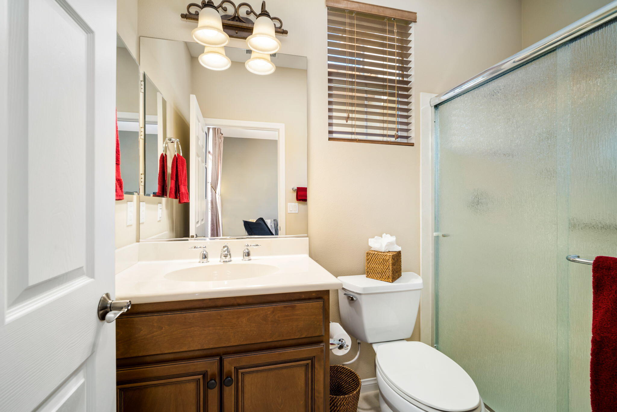 81820 Rustic Canyon Drive La Quinta, CA 92253 - Photo 31 of 85 a bathroom with a sink a toilet and a mirror