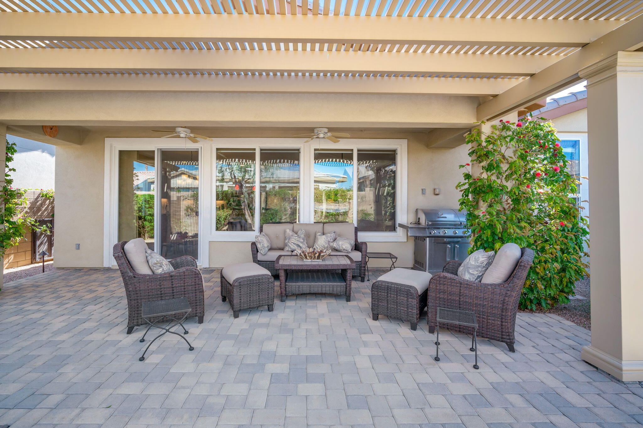 81820 Rustic Canyon Drive La Quinta, CA 92253 - Photo 33 of 85 a living room with furniture and a potted plant