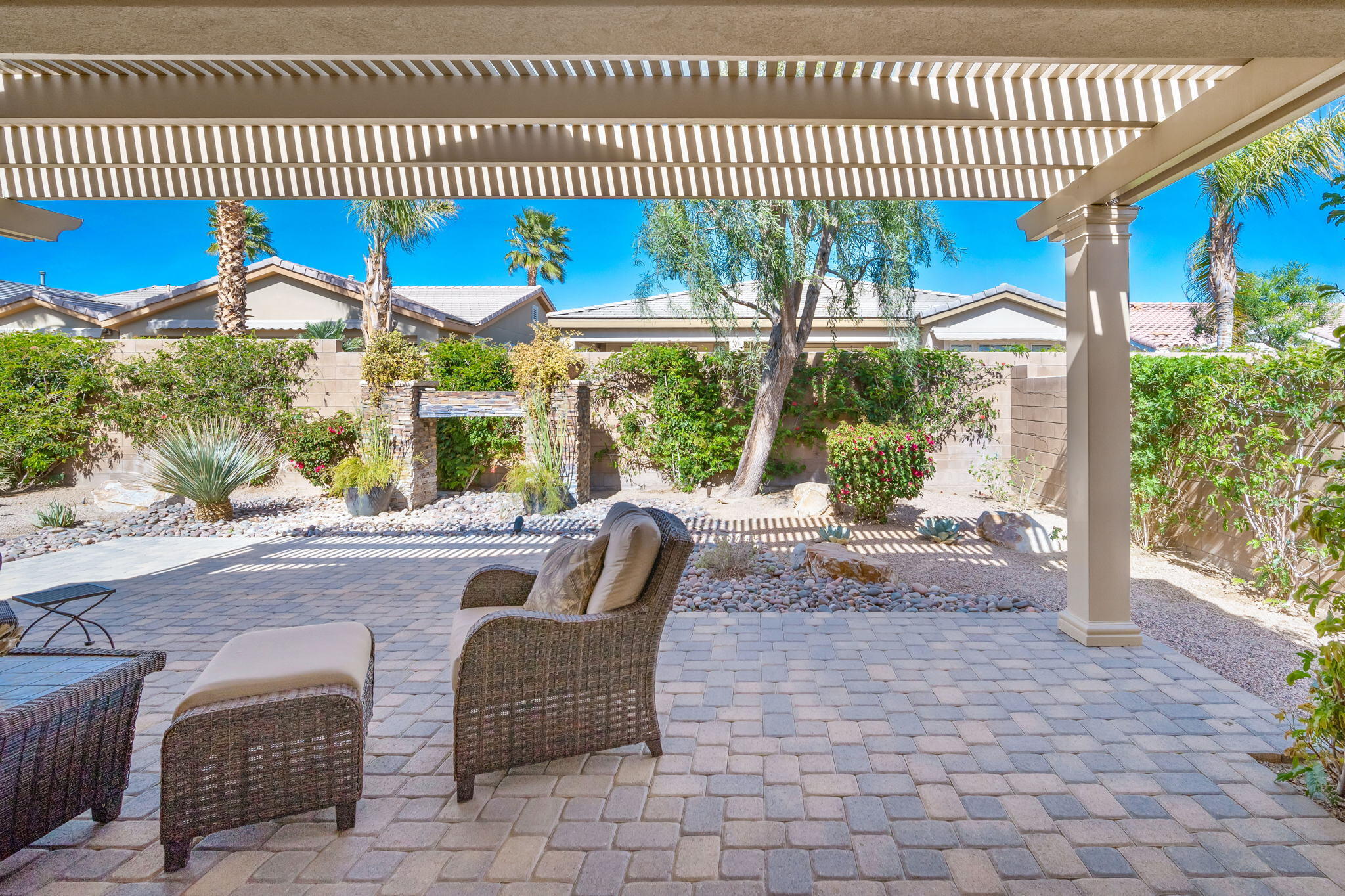 81820 Rustic Canyon Drive La Quinta, CA 92253 - Photo 37 of 85 a view of a patio with a table and chairs