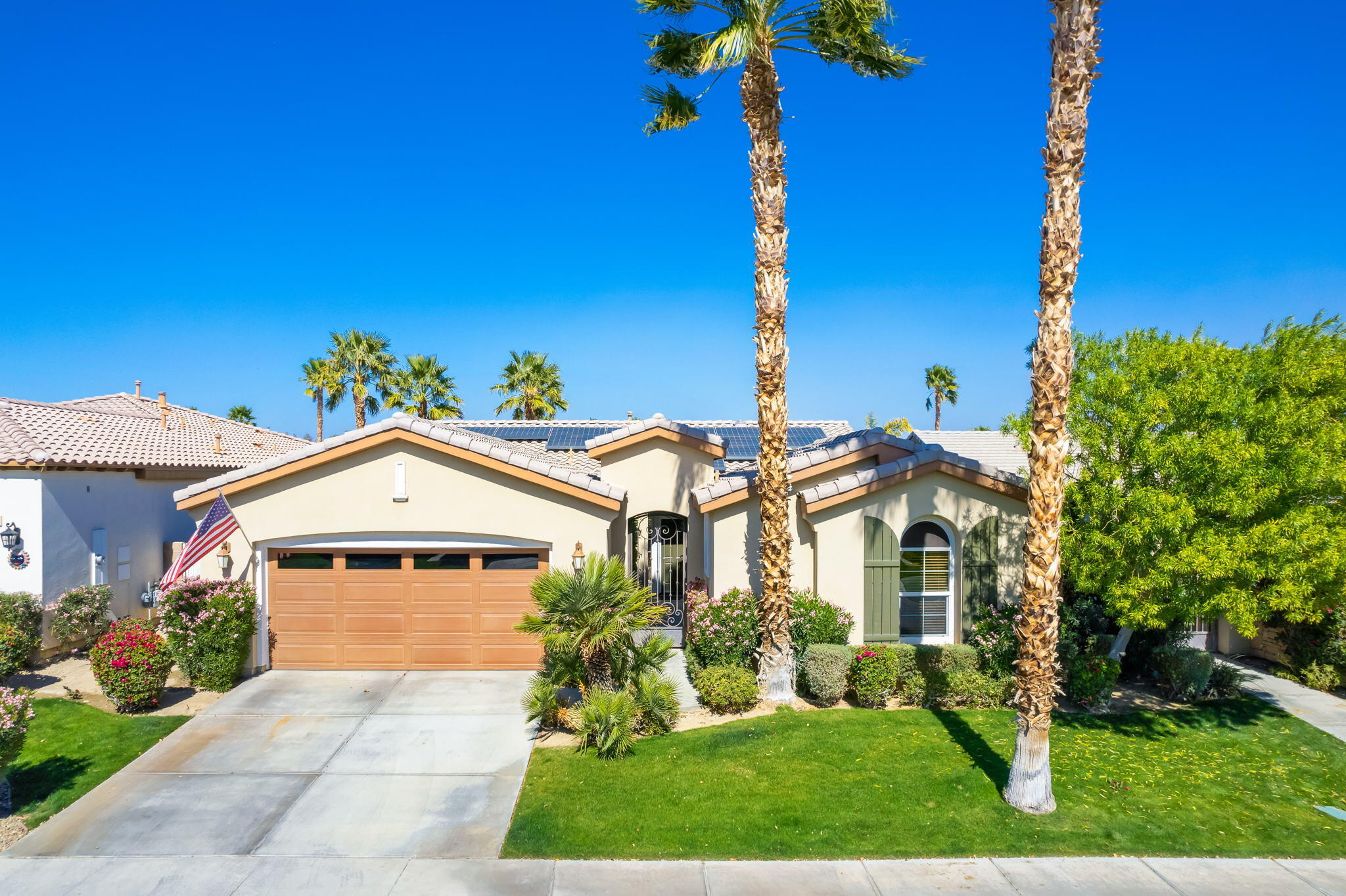 81820 Rustic Canyon Drive La Quinta, CA 92253 - Photo 42 of 85 front view of a house with a yard