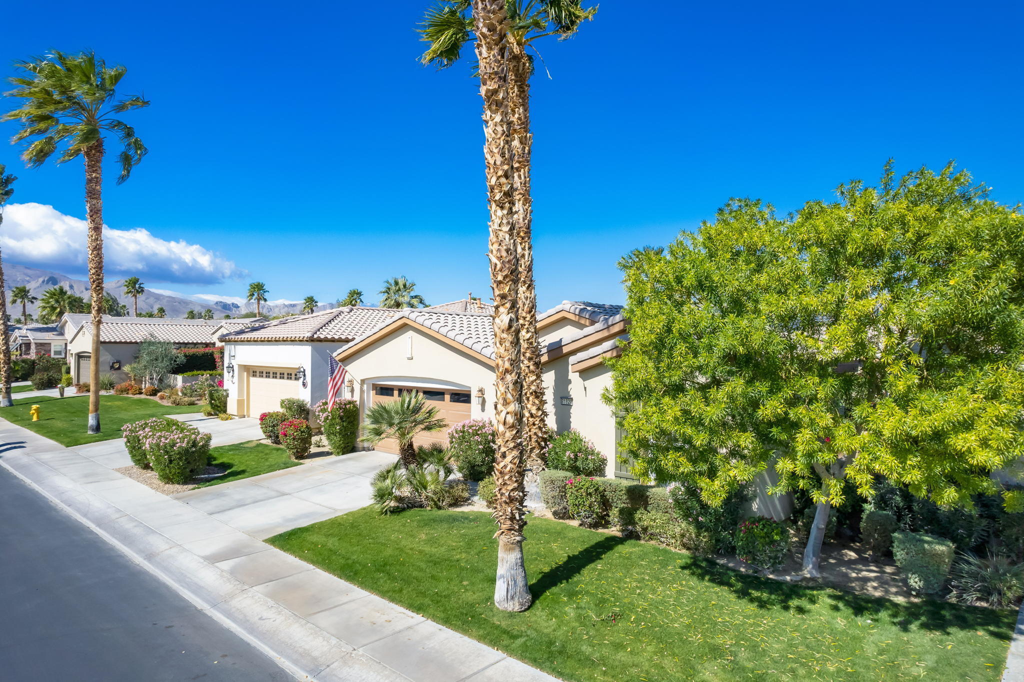 81820 Rustic Canyon Drive La Quinta, CA 92253 - Photo 43 of 85 a front view of a house with a yard