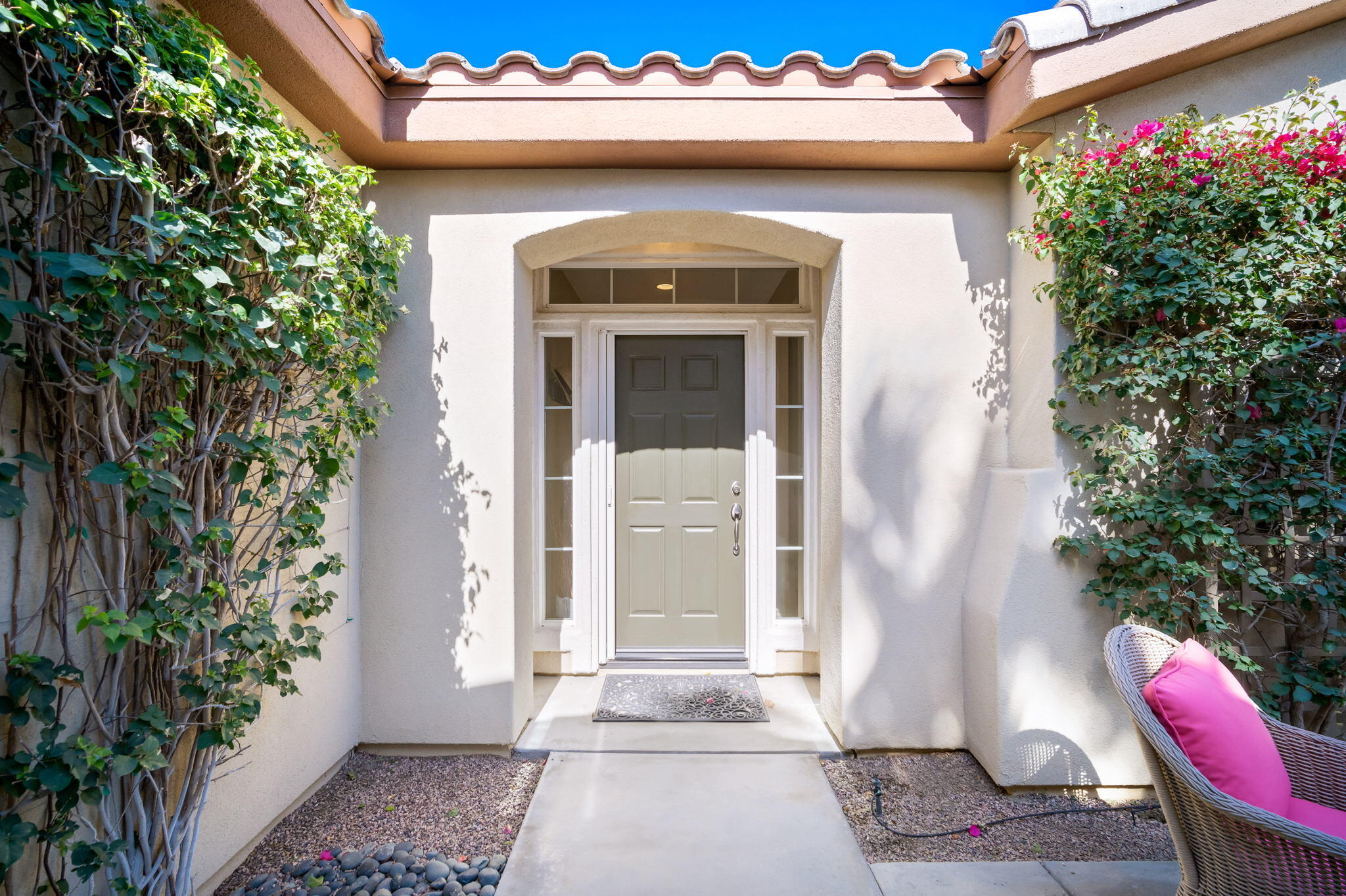 81820 Rustic Canyon Drive La Quinta, CA 92253 - Photo 5 of 85 a front view of a house with a yard