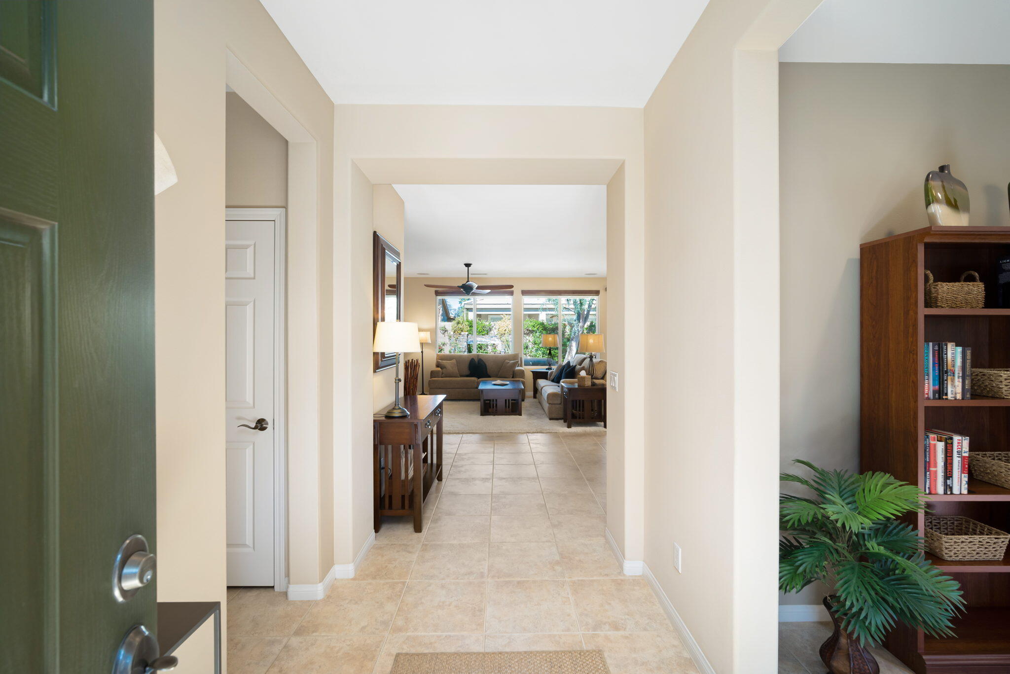 81820 Rustic Canyon Drive La Quinta, CA 92253 - Photo 6 of 85 a view of a livingroom with furniture and a potted plant