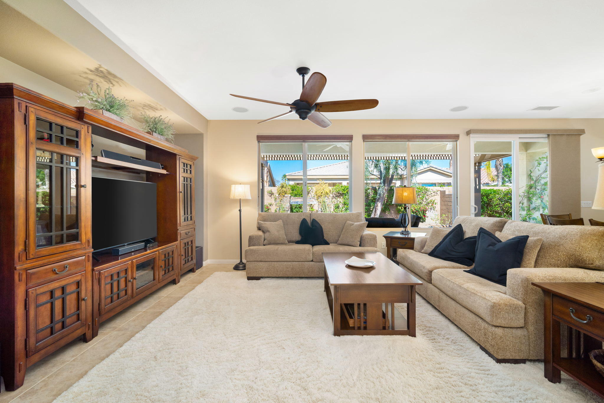 81820 Rustic Canyon Drive La Quinta, CA 92253 - Photo 7 of 85 a living room with furniture and a flat screen tv