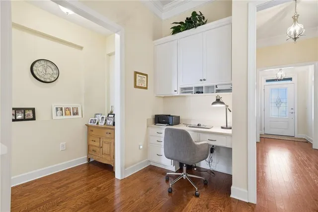 a bedroom with a bed and a table