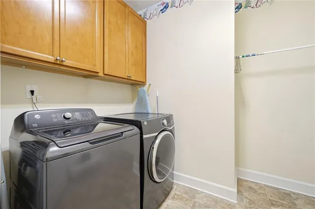 a view of a porch with furniture and front door