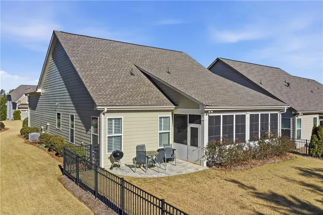 a view of a swimming pool with a patio