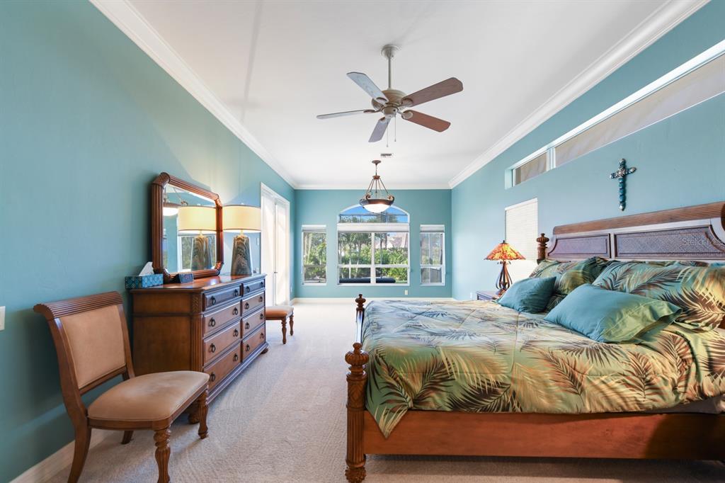 4911 Linkside Drive Punta Gorda, FL 33955 - Photo 27 of 64 a bed room with a bed and a chair