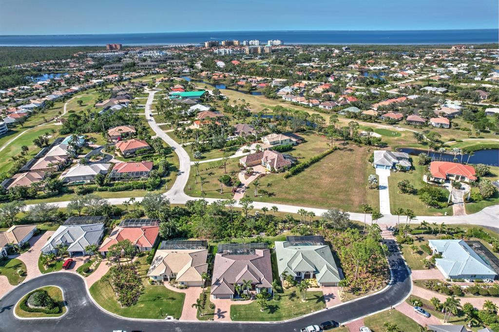 4911 Linkside Drive Punta Gorda, FL 33955 - Photo 45 of 64 an aerial view of a house with a swimming pool and outdoor seating