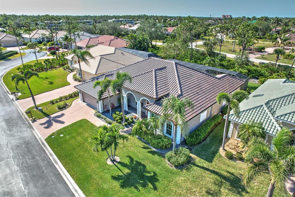 4911 Linkside Drive Punta Gorda, FL 33955 - Photo 62 of 64 an aerial view of a house with a garden and plants