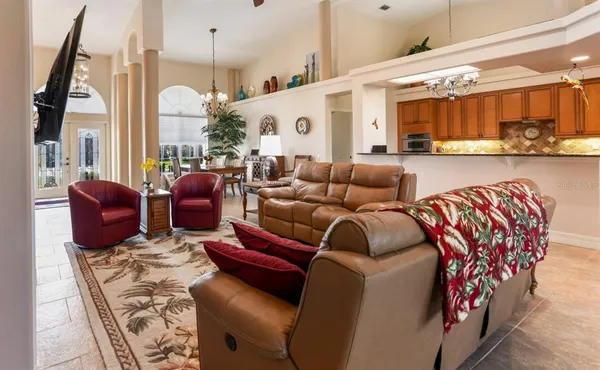 a living room with furniture and a rug