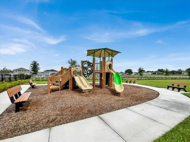 a view of a park with swings