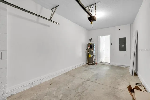 a view of empty room with ceiling fan