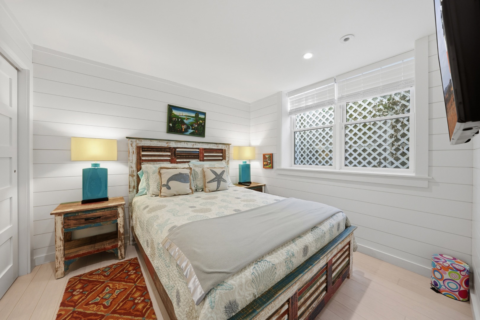 10 Pilgrim Road Nantucket, MA 02554 - Photo 49 of 65 a bedroom with a bed and a window