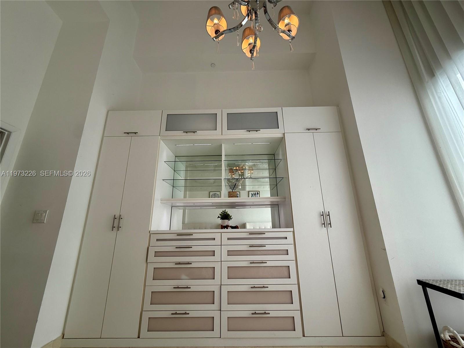 495 Brickell Avenue, Unit 1403 Miami, FL 33131 - Photo 30 of 48 a view of walk in closet