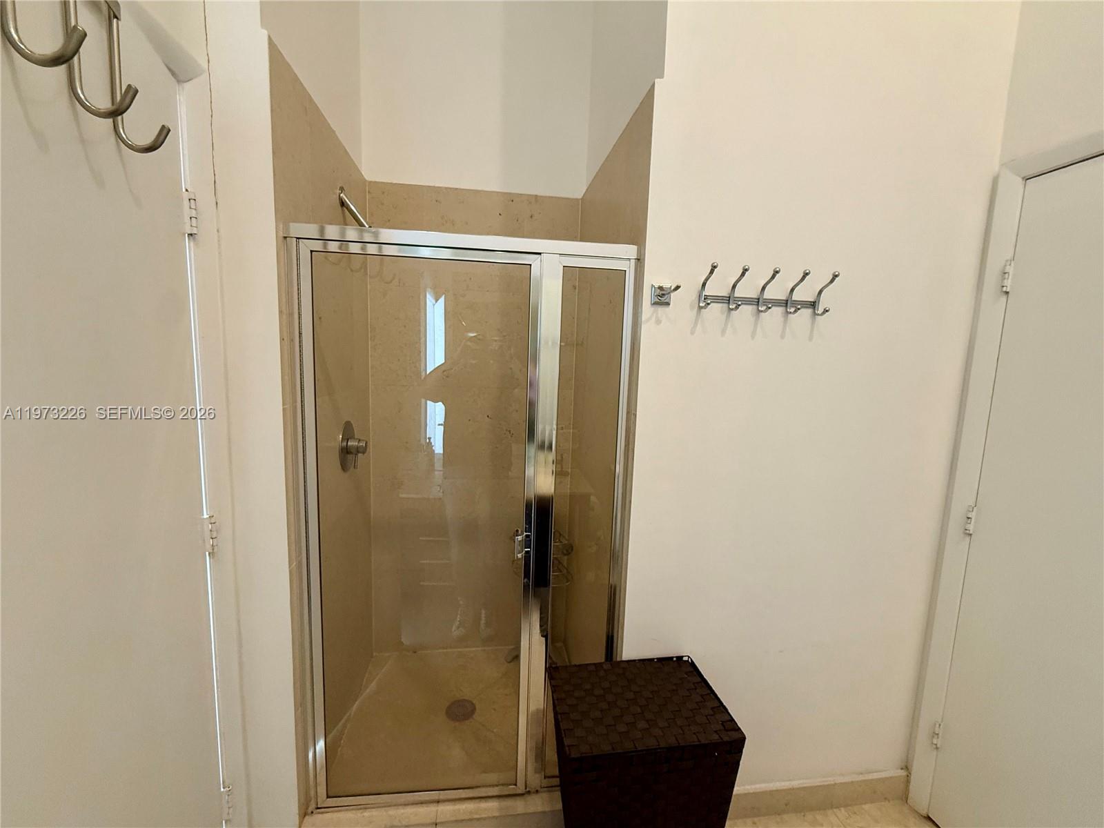 495 Brickell Avenue, Unit 1403 Miami, FL 33131 - Photo 33 of 48 a bathroom with a shower
